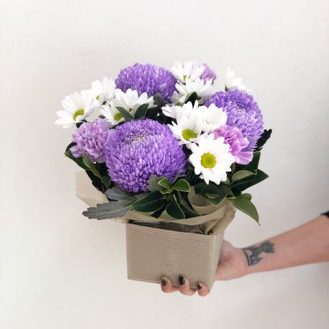 Designer’s Choice Pastel purple Arrangement - caringbahflowersgifts
